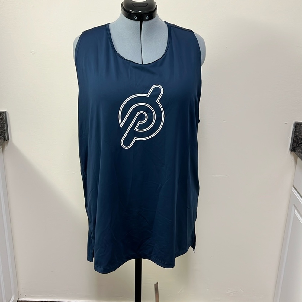 Adult size 2XL Peloton muscle tank blue. Size runs large and is very long